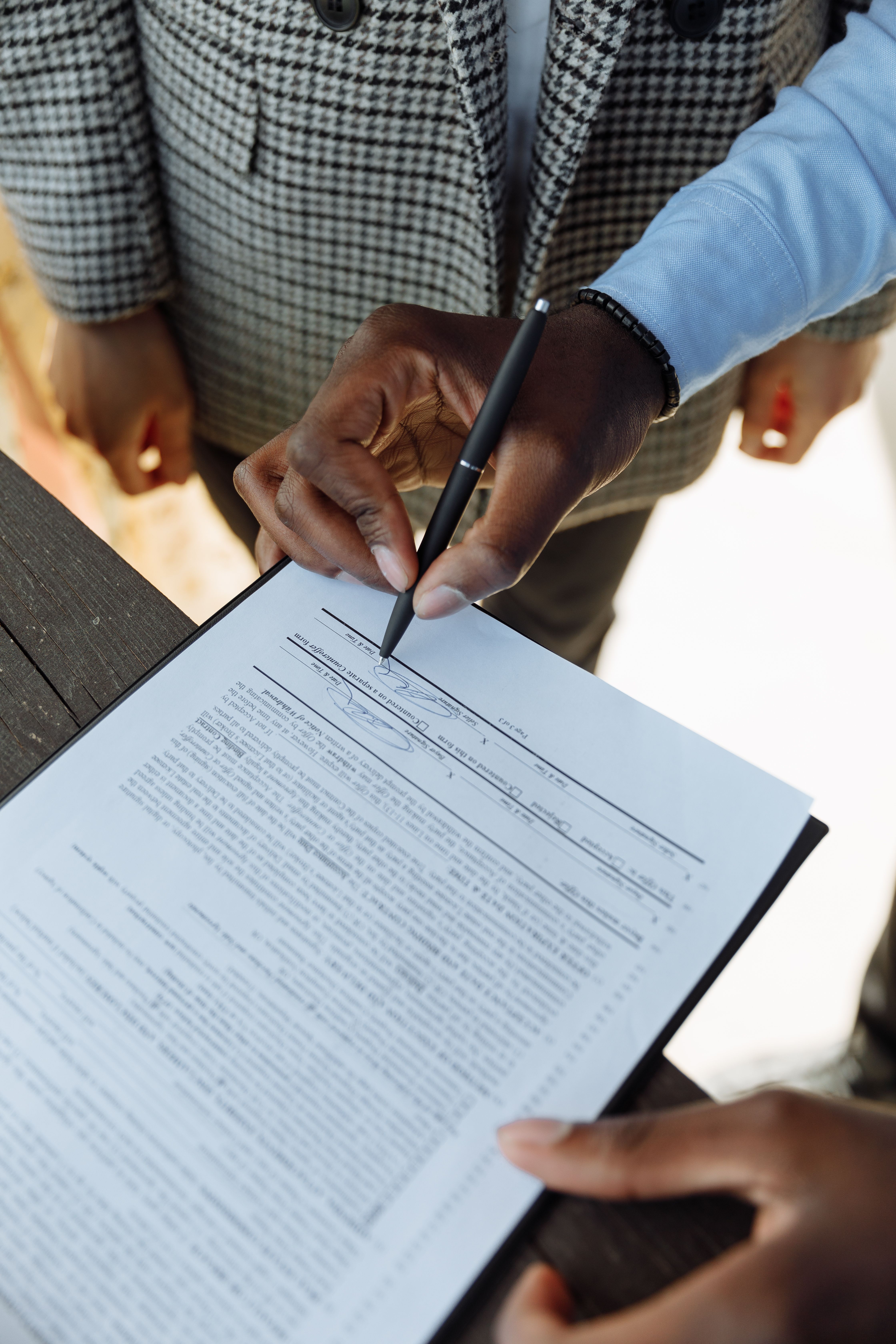 Person signing a contract